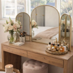 Modern Wood Makeup Vanity with Arched Gold Trifold Mirror and Storage Stool